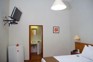 TV a/nebo společenská místnost v ubytování DM Hoteles Mossone - Ica