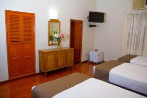 Postel nebo postele na pokoji v ubytování DM Hoteles Mossone - Ica