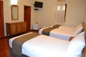 Postel nebo postele na pokoji v ubytování DM Hoteles Mossone - Ica