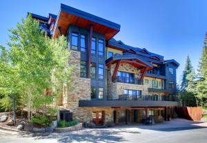 a large building with a gambrel roof at Lumiere with Inspirato in Telluride