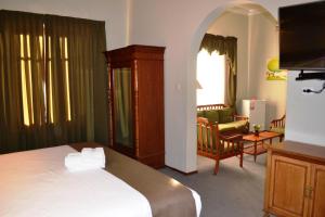 Postel nebo postele na pokoji v ubytování DM Hoteles Mossone - Ica