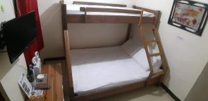 Postel nebo postele na pokoji v ubytování JaiJai's Backpackers Inn