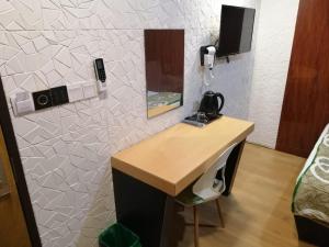 TV a/nebo společenská místnost v ubytování Qing yun resthouse Bandar, Brunei Darussalam