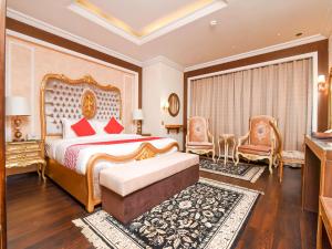 Postel nebo postele na pokoji v ubytování Ras Al Khaimah Hotel