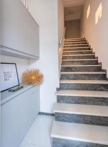 a staircase in a house with concrete steps at Upper Hydra in Hydra