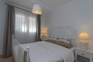 Postel nebo postele na pokoji v ubytování Fantastic 3 Bedroom Townhouse Golf Del Sur - The Palms Resort + 16 fotografií