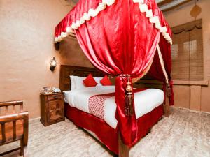 Postel nebo postele na pokoji v ubytování Ras Al Khaimah Hotel