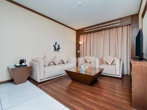 TV a/nebo společenská místnost v ubytování Ras Al Khaimah Hotel