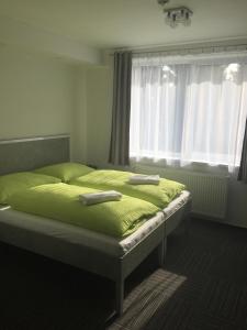 Giường trong phòng chung tại Garni Hotel 31