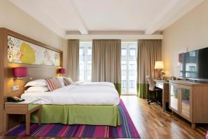 TV a/nebo společenská místnost v ubytování Elite Hotel Esplanade