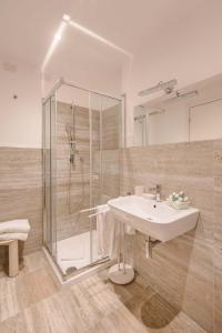 Kylpyhuone majoituspaikassa Miramare Hotel