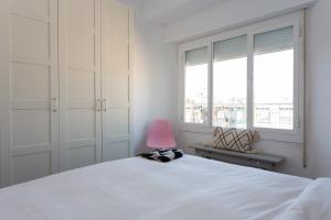 Een bed of bedden in een kamer bij Casa Cosi - Atico