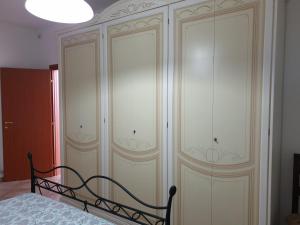 Postel nebo postele na pokoji v ubytování case vacanze, La casa di Angelo, con terrazzo