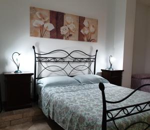 Postel nebo postele na pokoji v ubytování case vacanze, La casa di Angelo, con terrazzo