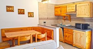 Kuchyň nebo kuchyňský kout v ubytování Casa Nonno Sergio lake view by Gardadomusmea + 17 fotografií