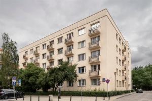 Budova, v ktorej sa apartmán nachádza + 3 fotografie