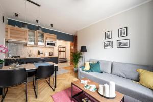 Kuchyňa alebo kuchynka v ubytovaní Apartament Ogród Krasińskich