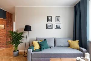 Posedenie v ubytovaní Apartament Ogród Krasińskich