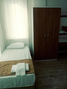 Postel nebo postele na pokoji v ubytování Valeri Beach Hotel