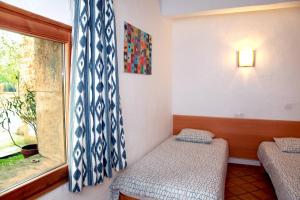 Cama o camas de una habitación en Finca Son Guardiola