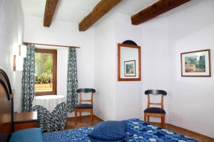 Cama o camas de una habitación en Finca Son Guardiola