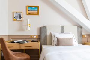 Cama ou camas em um quarto em Hôtel Longemalle