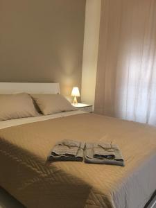 A bed or beds in a room at Casa vacanze Circle House Santa Filomena