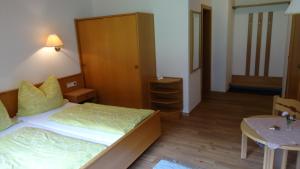 Postel nebo postele na pokoji v ubytování Ferienhaus Enzi