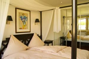 Postel nebo postele na pokoji v ubytování CityHomeMunich + 52 fotografií