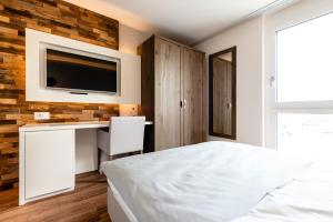 Postel nebo postele na pokoji v ubytování Hotel Rubus