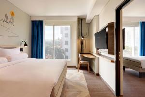 เตียงในห้องที่ ibis Styles Jakarta Simatupang
