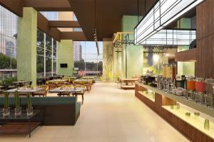 ห้องอาหารหรือที่รับประทานอาหารของ ibis Styles Jakarta Simatupang