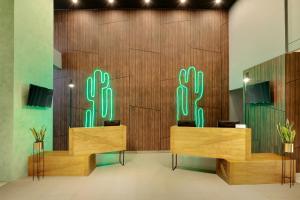 โทรทัศน์และ/หรือระบบความบันเทิงของ ibis Styles Jakarta Simatupang