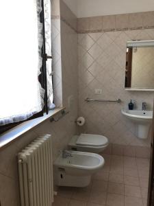 Ett badrum på Casavacanze estate 3