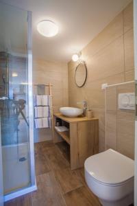 Koupelna v ubytování Apartmani Kraj mora