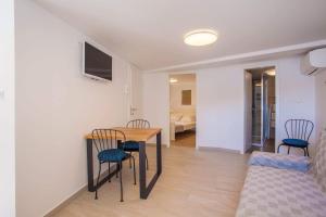 TV a/nebo společenská místnost v ubytování Apartmani Kraj mora