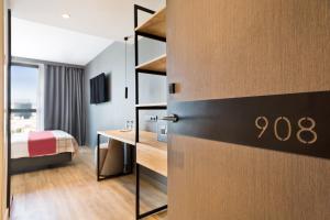 Cama o camas de una habitación en Acta Voraport