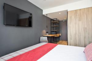Cama o camas de una habitación en Acta Voraport