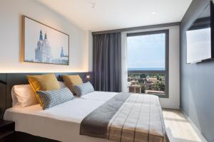 Cama o camas de una habitación en Acta Voraport