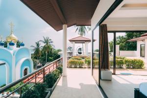 a view from the balcony of a house with a gazebo at Lilu Villa In Lamai in Lamai