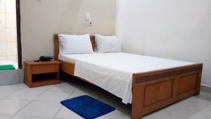 Postel nebo postele na pokoji v ubytování Nora Hotel