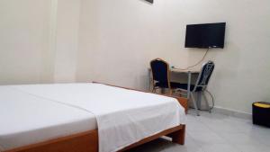 TV a/nebo společenská místnost v ubytování Nora Hotel