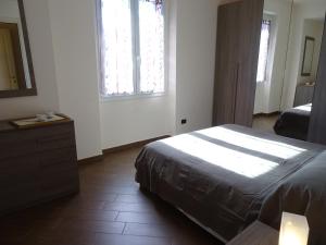 Postel nebo postele na pokoji v ubytování Casa Costa Outlet 5