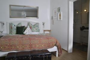 Ein Bett oder Betten in einem Zimmer der Unterkunft Romantisches Bed&Breakfast Apfelstern