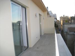 A balcony or terrace at Penthouse Santa Croce