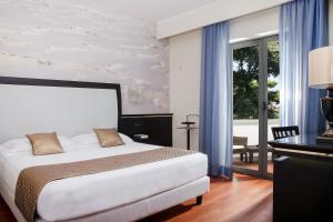 Postel nebo postele na pokoji v ubytování Hotel St.Mauritius