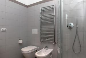 Koupelna v ubytování Uma Apartments