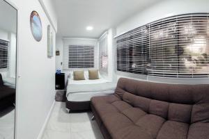 Cama ou camas em um quarto em Hotel Las Lunas