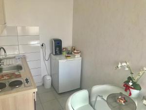 Kuchyňa alebo kuchynka v ubytovaní Studio apartman Valentina