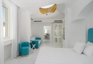 Postel nebo postele na pokoji v ubytování Hotel Lorelei Londres